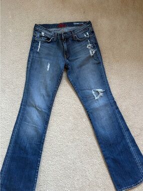 Women’s Distressed Dark Blue Flare Jeans